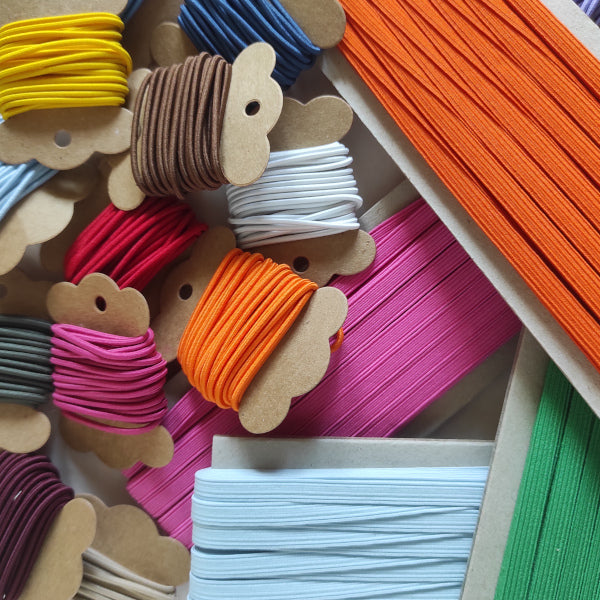 Elastici piatti e rotondi per cucito creativo e legatoria disponibili in diversi colori