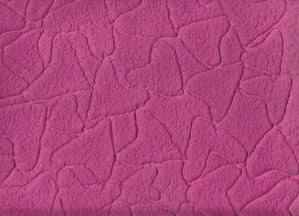 Carta di gelso fucsia con motivo a cuori e riccioli decorativi in rilievo