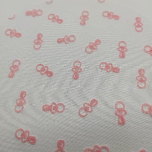 Tulle floccato con motivo "ciucci" per bomboniere battesimo - colore rosa